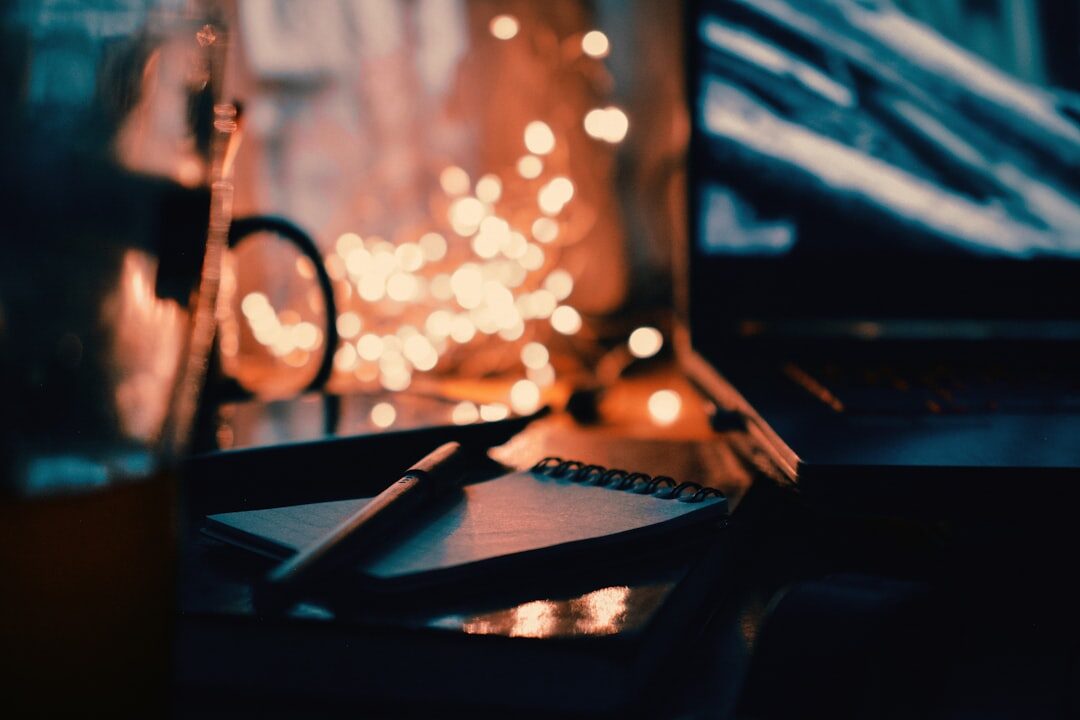 notebook and pen on desk