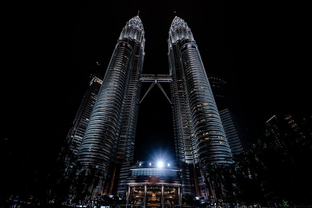 Kuala Lumpur city skyline with the Petronas Towers at dusk